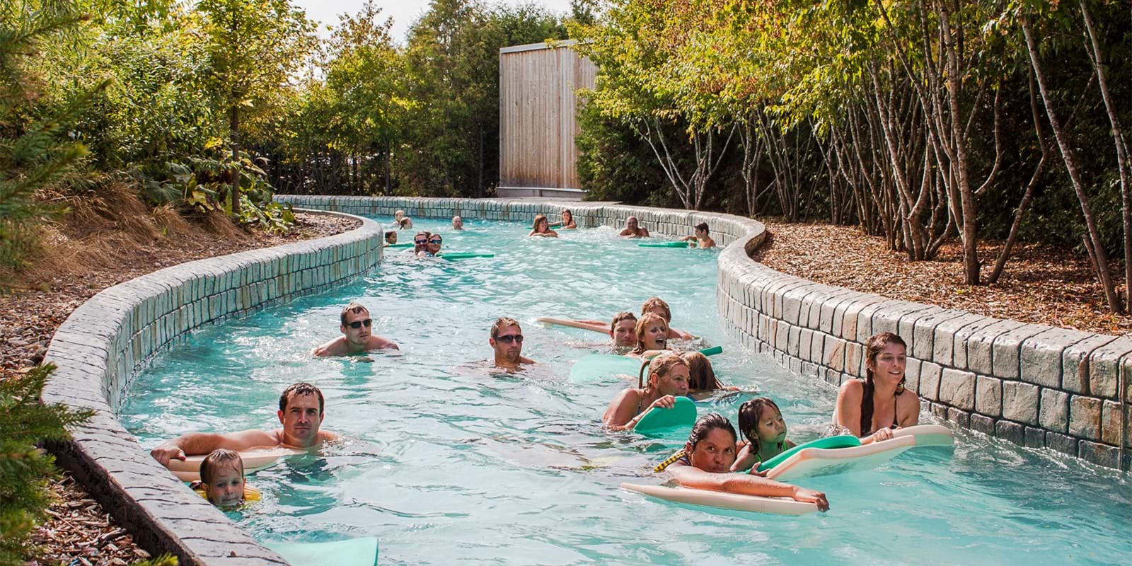 Guests floating in theme river